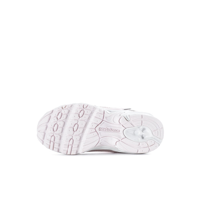 Toddler sneaker outsole in light pink and white with molded tread