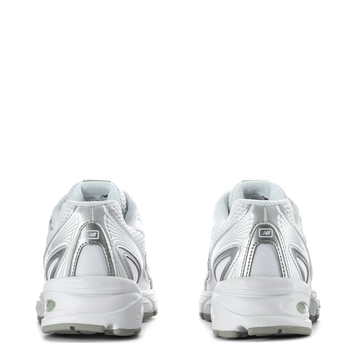 Women's white lace-up sneakers with padded heel and rear branding detail