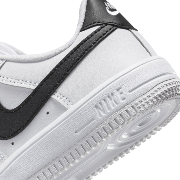 Kids' sneaker midsole and outsole close-up with Nike branding