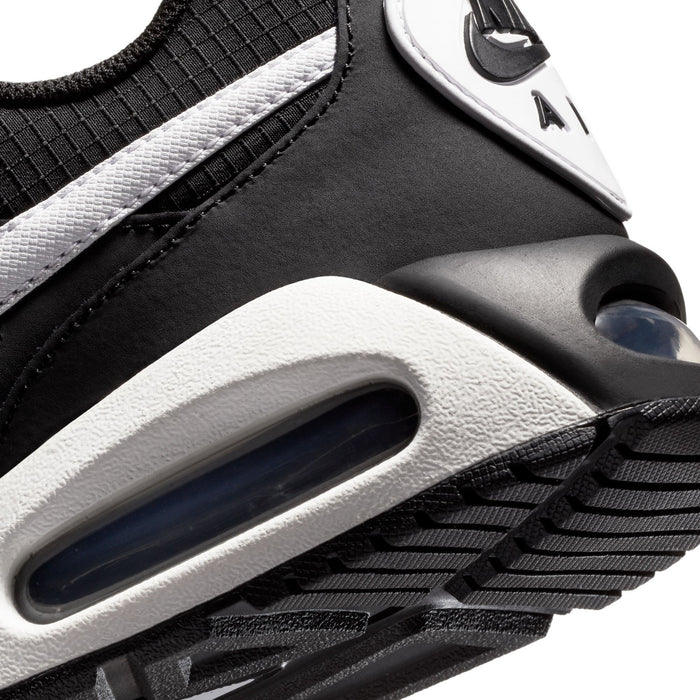 Men's Nike Air Max IVO midsole close-up, white foam edge over dark Air window