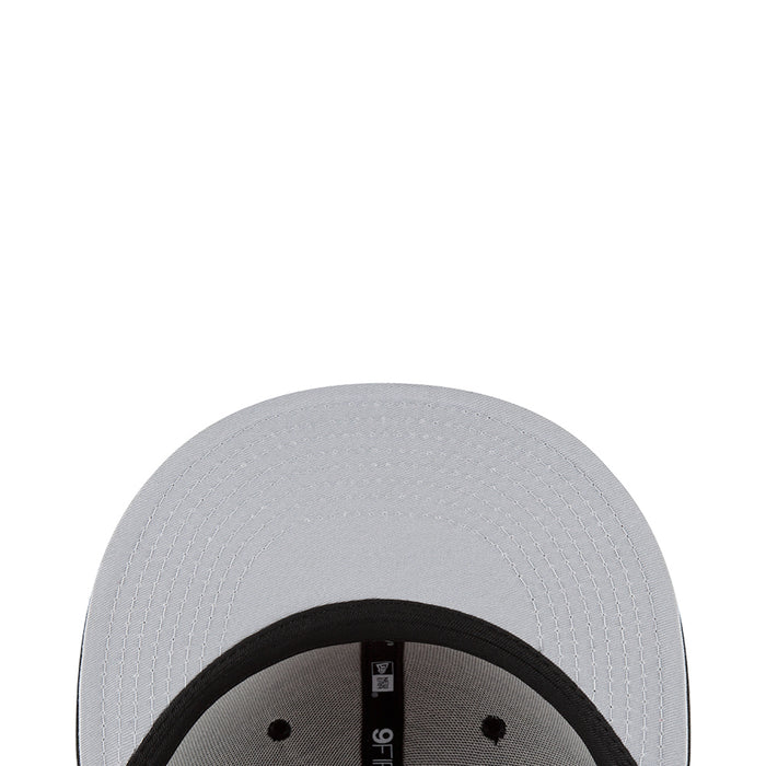 Light gray/white baseball cap top with black inner brim