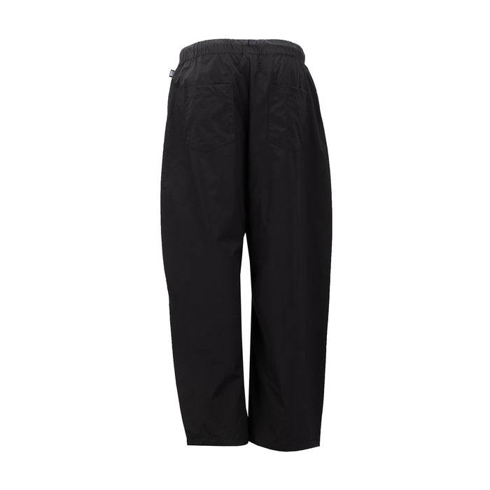Women's black barrel pants, elastic waist with drawstring, back view with relaxed fit