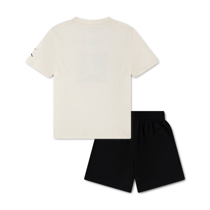 Toddler two-piece short set with ivory T-shirt and black shorts, no visible logo.