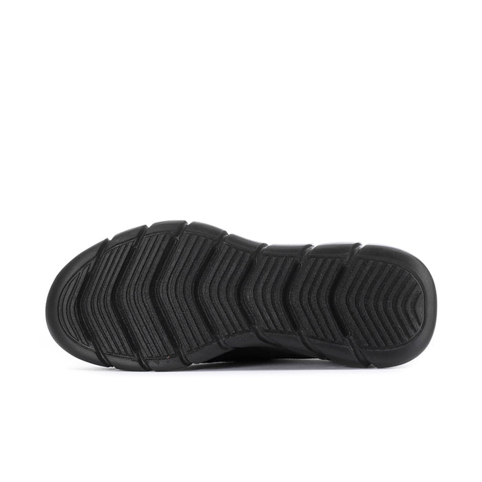 Black slip-on sneaker outsole with deep traction tread pattern