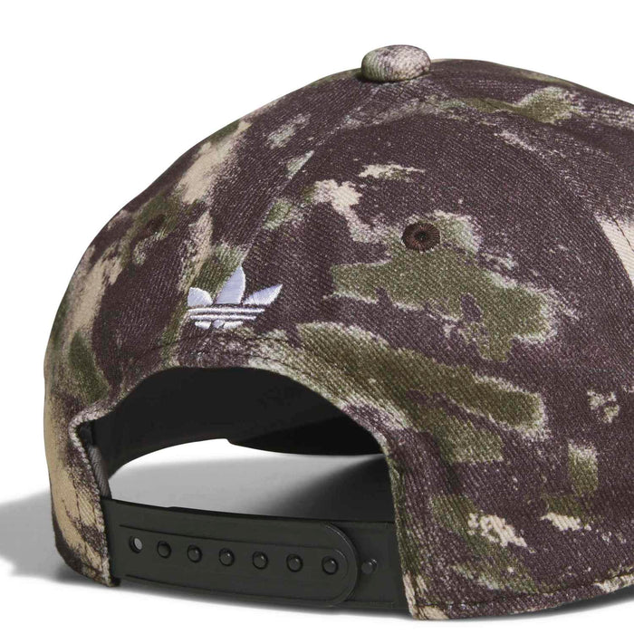 Camo snapback cap close-up with woven pattern, snapback holes, and curved brim