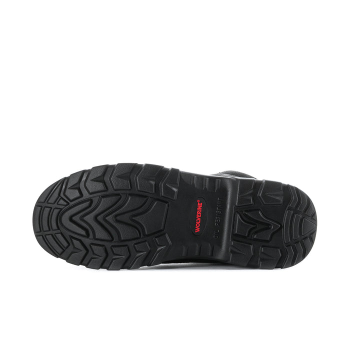 Black textured rubber outsole with deep tread and small red logo patch