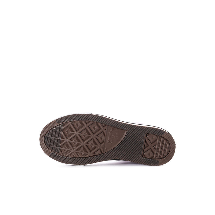 Kids sneaker outsole view with dark rubber tread pattern
