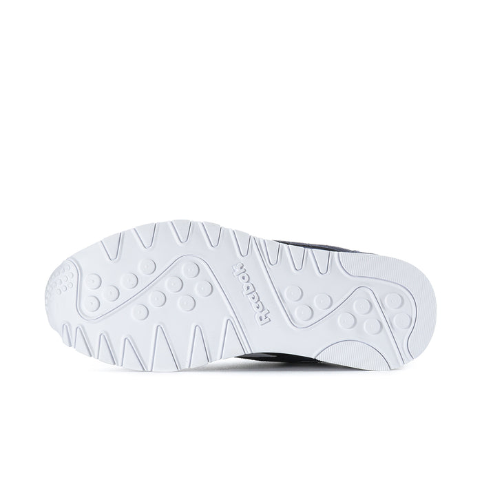 Men's sneaker outsole with textured tread and white rubber base.