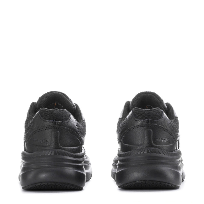 Black slip-resistant women's sneakers, back view with heel tab and ridged sole