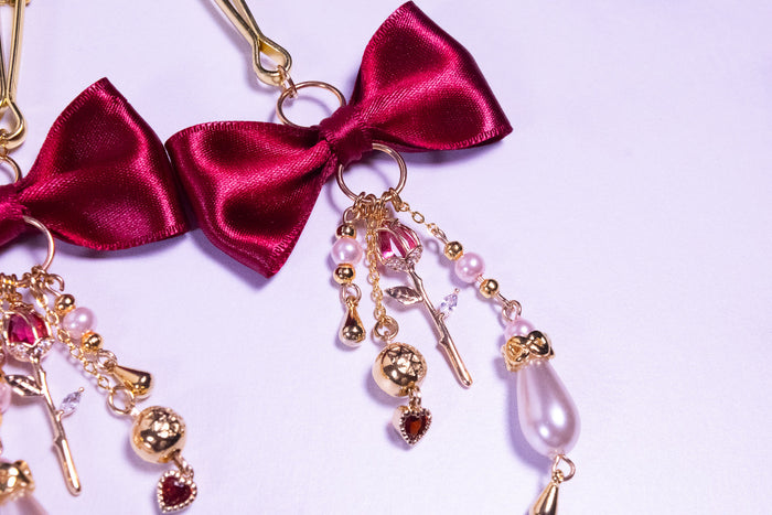 Deluxe Red Bow Tweezer Nipple Clamps in Gold