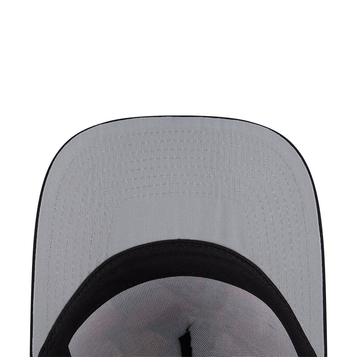 Gray cap top panel with black inner brim curve and ventilation eyelets