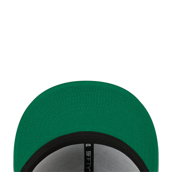 Green underside and black inner band of a grey 5950 baseball cap