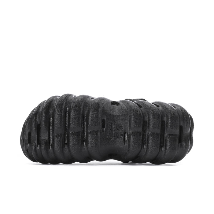 Men's black clog outsole with deep tread and molded traction pattern