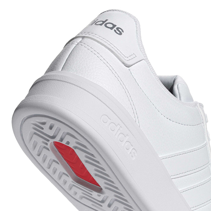 White adidas Grand Court 3.0 women's outsole close-up with red heel patch