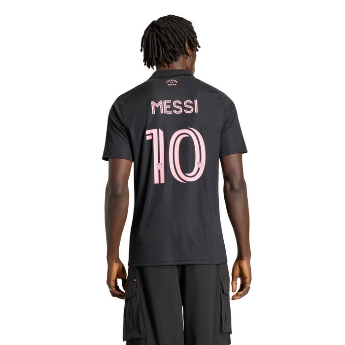 Men's black soccer jersey back view with pink 'MESSI' name and '10' number