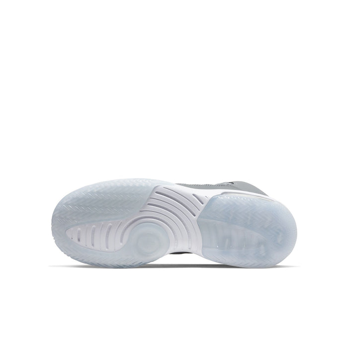 Youth basketball shoe outsole with translucent light-blue rubber and tread pattern