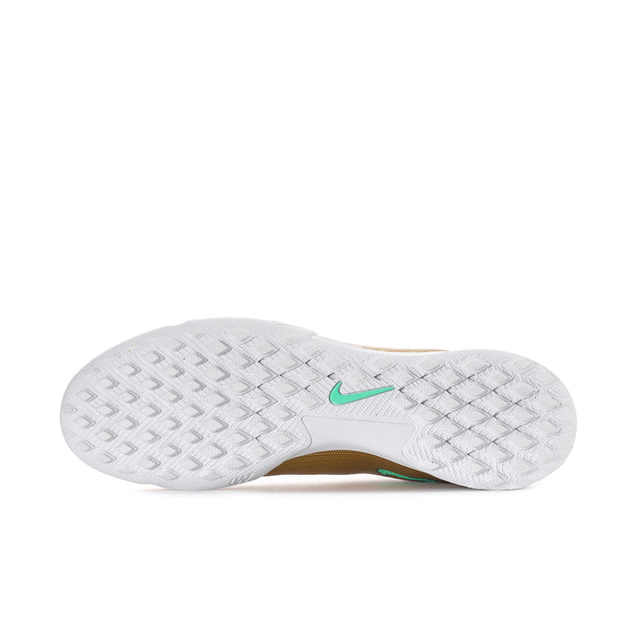 Men's TF soccer cleat outsole, white tread with teal accent and textured pattern