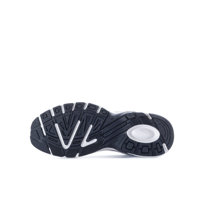Youth sneaker outsole view with dark traction tread and white cushioning insert