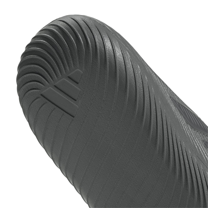 Grey slide sandal sole detail with ribbed traction lines