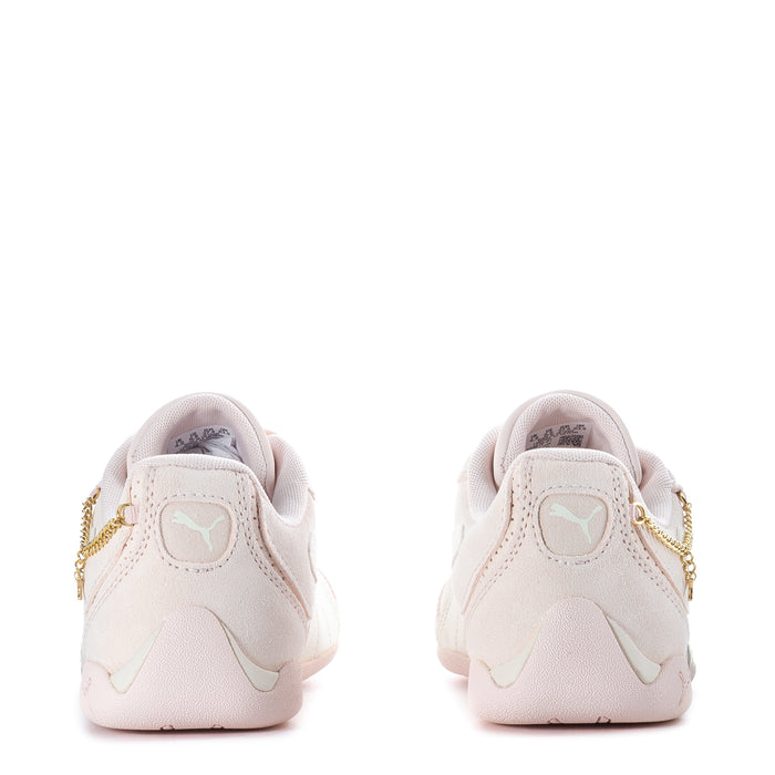 Youth sneaker heel view, light pink with Puma logo and gold side chain trim
