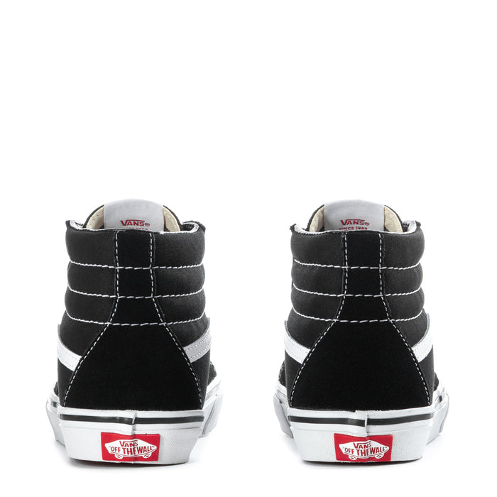 Youth black high-top sneakers heel view with white stitching, white midsole, red logo tag