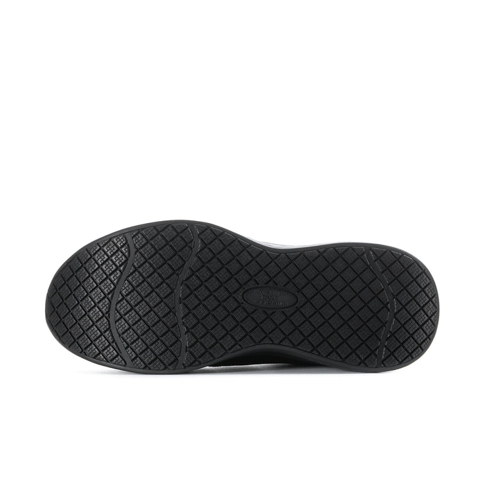 Black rubber outsole with patterned tread for slip resistance and traction