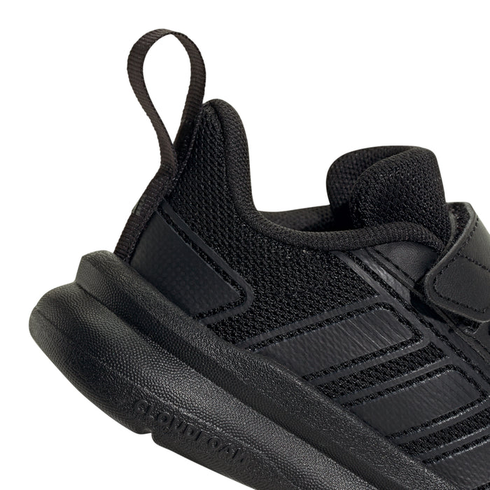 Toddler black running shoe close-up of side panel, lace area, and cushioned midsole