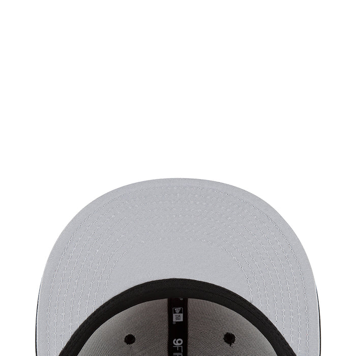 Light gray/white baseball cap interior with black underbrim and size tag