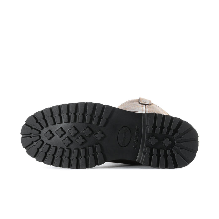 Men's steel-toe work boot outsole, black rubber traction tread with textured lugs
