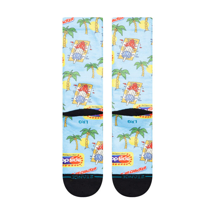 Unisex crew socks with light blue popsicle pattern and palm trees, black toe and heel