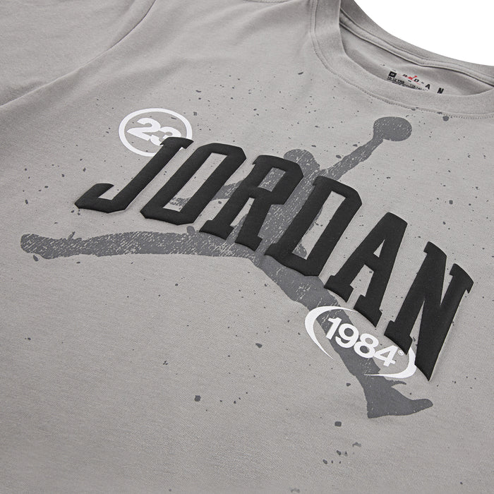 Medium grey youth T-shirt with large Jordan logo and 1984 graphic print