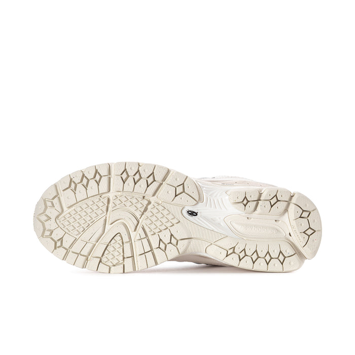 Women's sneaker outsole with textured tread on light rubber sole