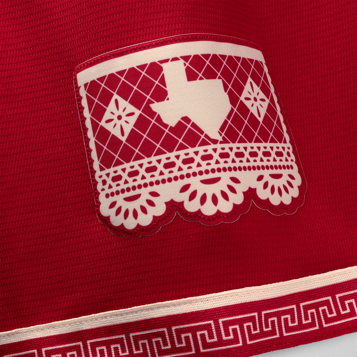 Red jersey sleeve patch with cream crest and geometric trim band