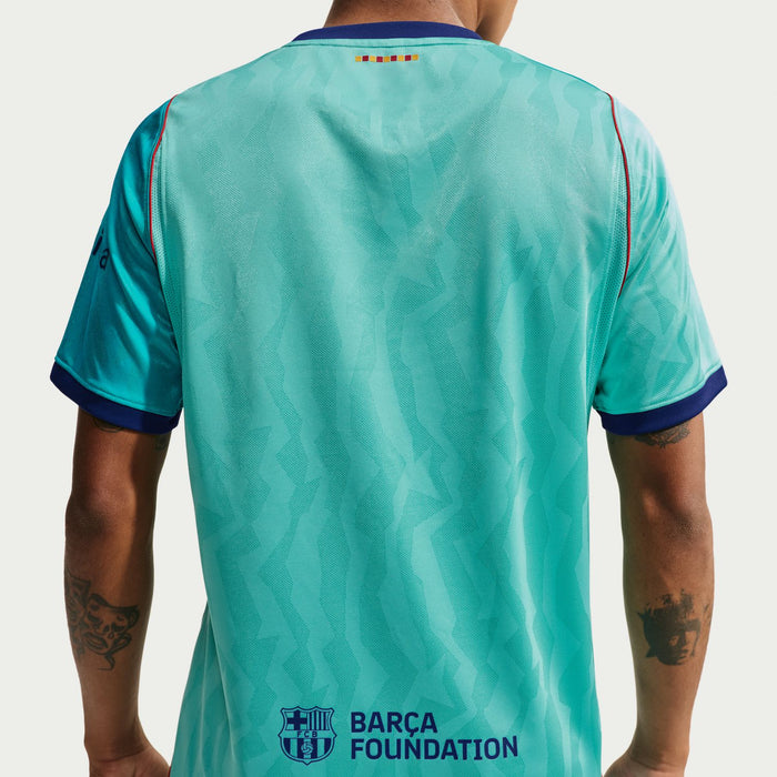 Men's teal soccer jersey back view with rainbow band trim at the neckline
