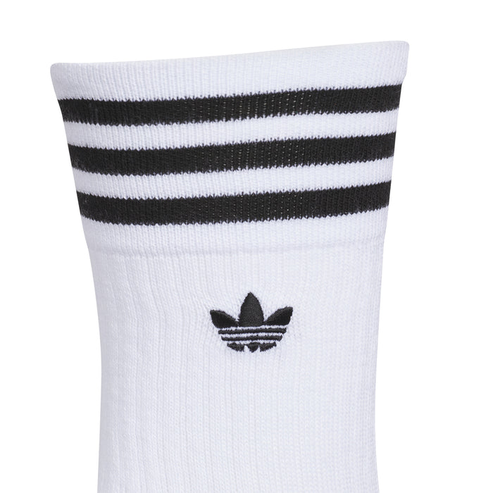 White crew sock with black-and-white striped cuff and adidas trefoil logo