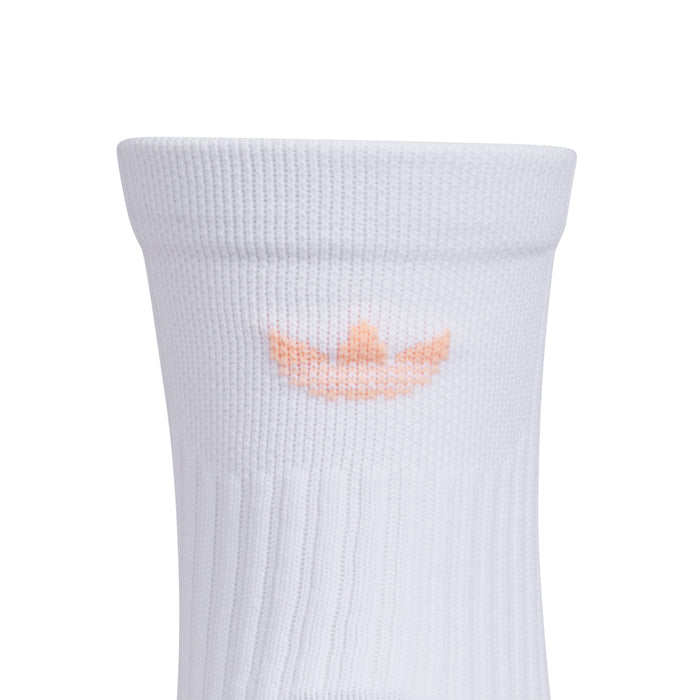 White high quarter crew sock with orange cuff logo