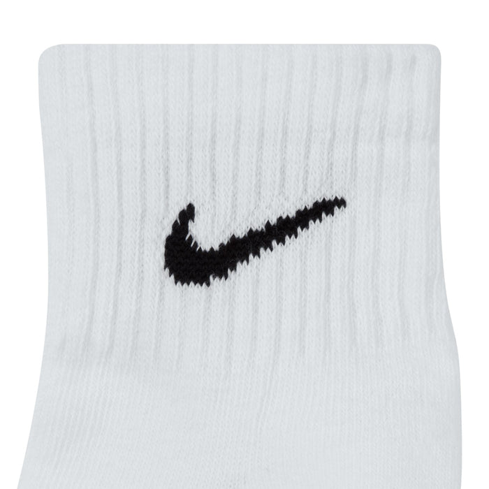 White quarter sock close-up with black Nike swoosh logo