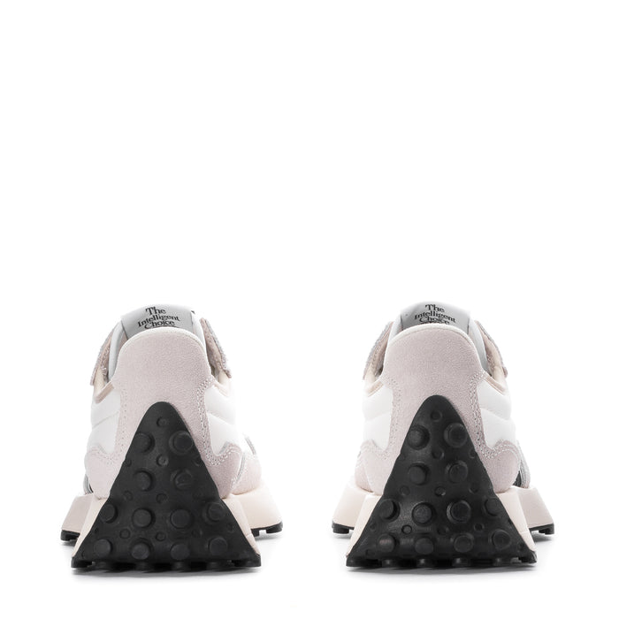 Women's sneakers heel view, white upper with black outsole pods and logo