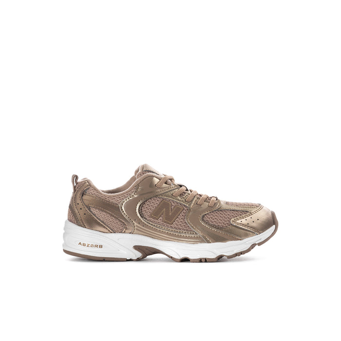 Kids beige lace-up athletic sneakers with N logo and white cushioned sole