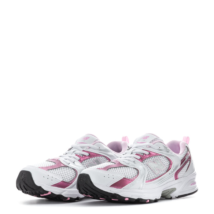 Kids running shoes pair, white with pink details, lace-up mesh upper and cushioned sole