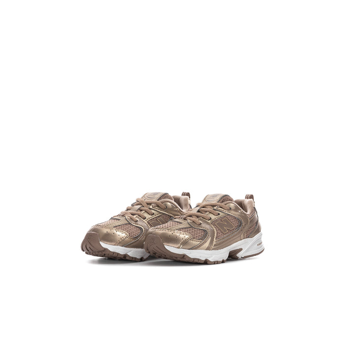 Toddler lace-up sneaker in tan-brown with textured panels and white midsole