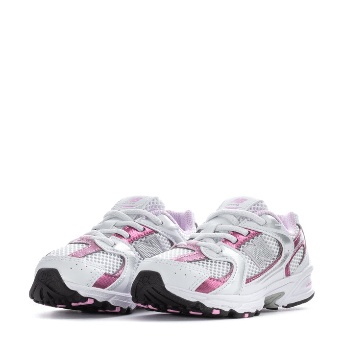 Toddler sneakers pair, white with pink trim, lace-up sport design