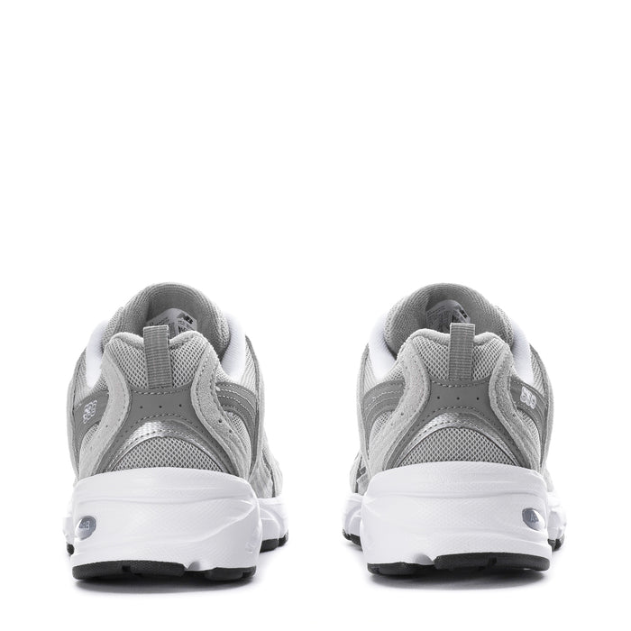 Women's wide gray New Balance 530 sneakers, rear view with white midsoles