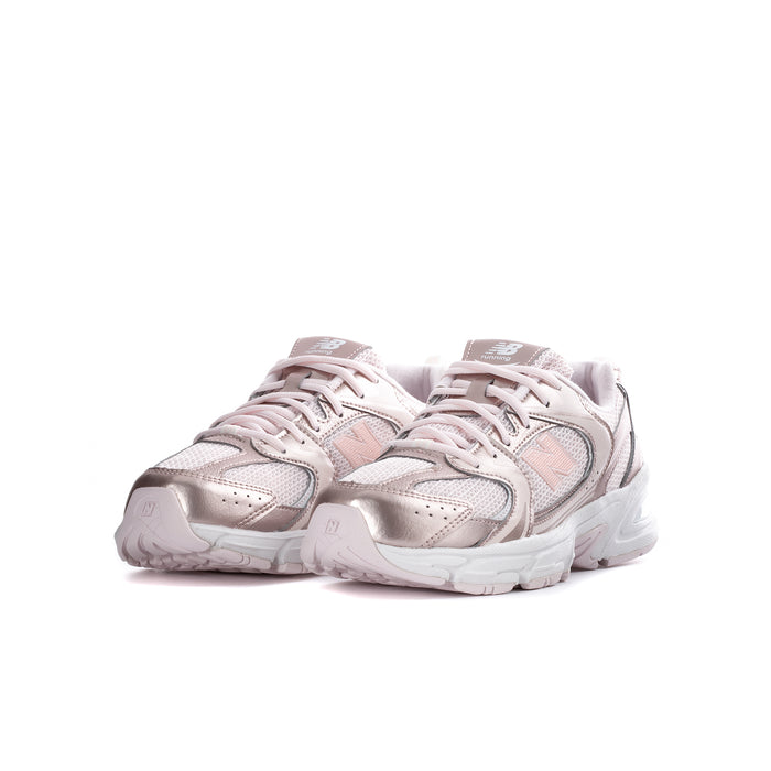Youth lace-up running sneaker with light pink upper, metallic accents, and chunky white midsole.