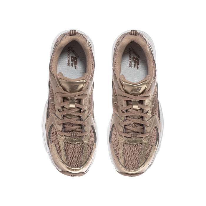 Youth lace-up sneaker upper in taupe with padded collar and visible interior lining.