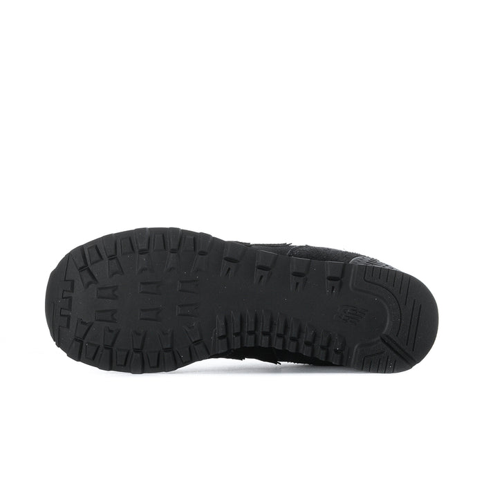 Men's New Balance 574 sneaker outsole in black, textured tread and sidewall details.