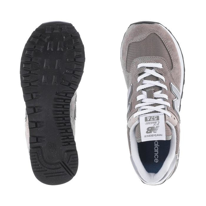 Women's New Balance 574 outsoles and inner side view, black tread sole and grey upper
