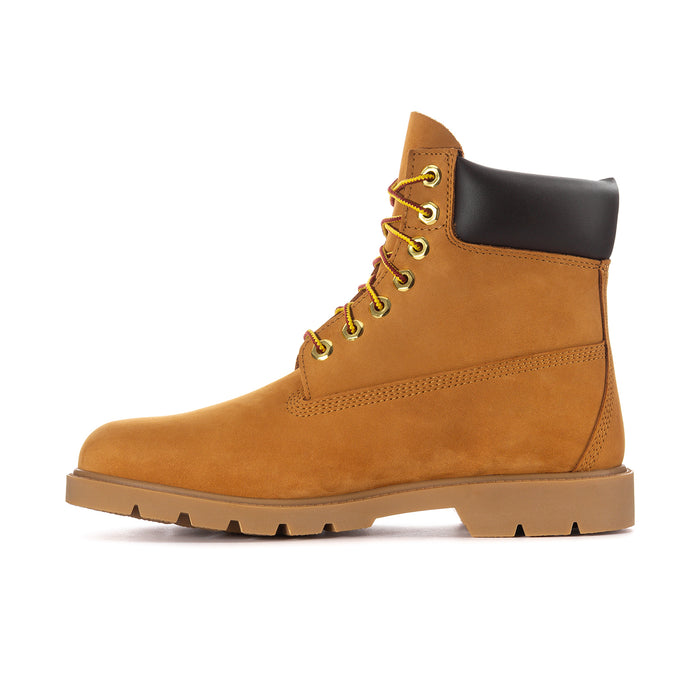 Men's wheat work boot profile with yellow lace eyelets and dark ankle lining