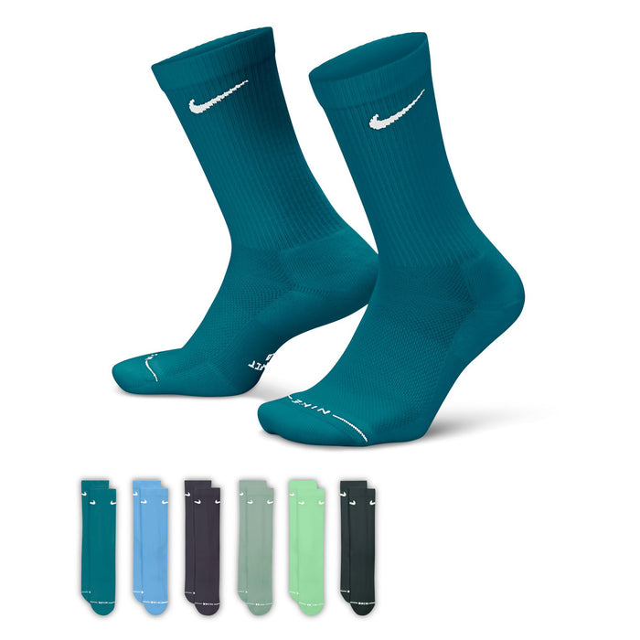 Teal crew socks with white Nike Swoosh logo, cushioned toe and heel