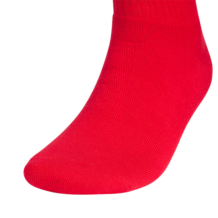 Red crew sock with ribbed knit and a smooth, rounded toe
